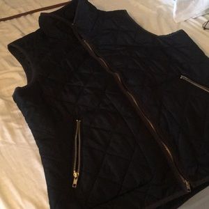 Black vest gold zipper